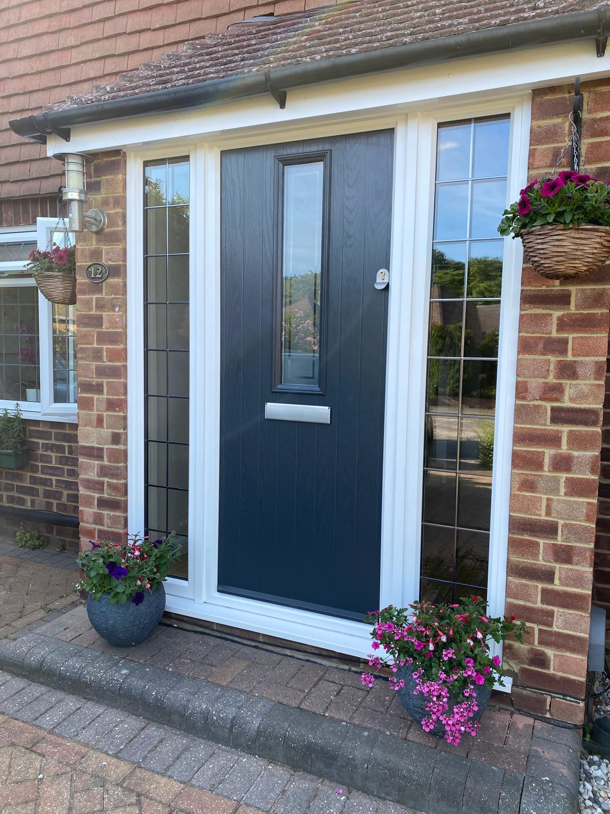 Navy composite front door with sidelights